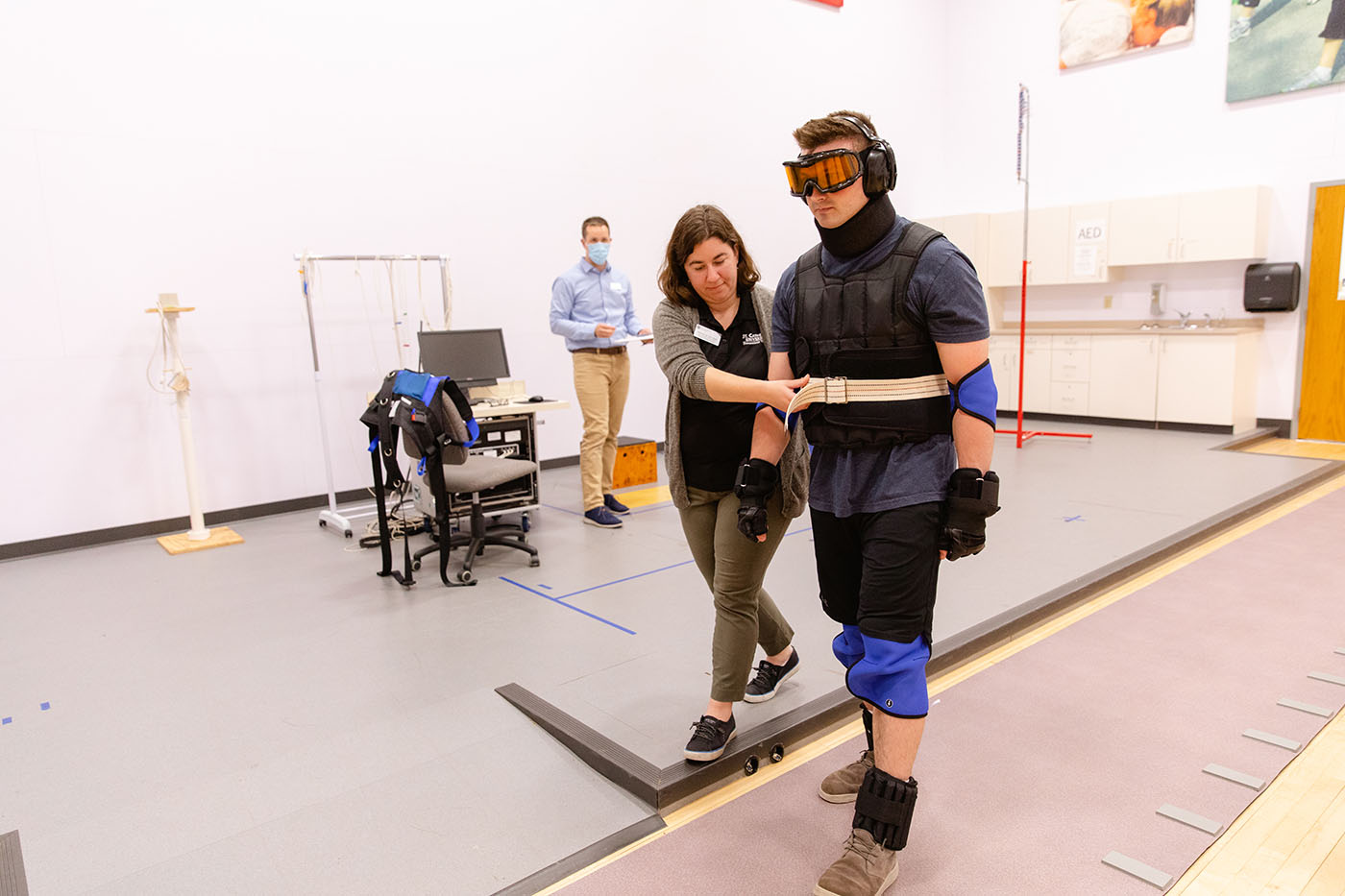 Student and teacher working in simulation space