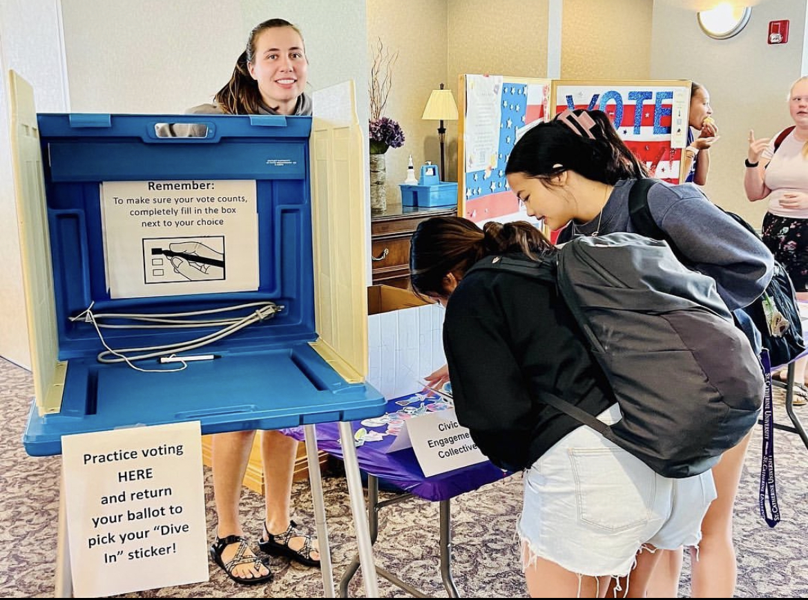 Voters practicing ballots