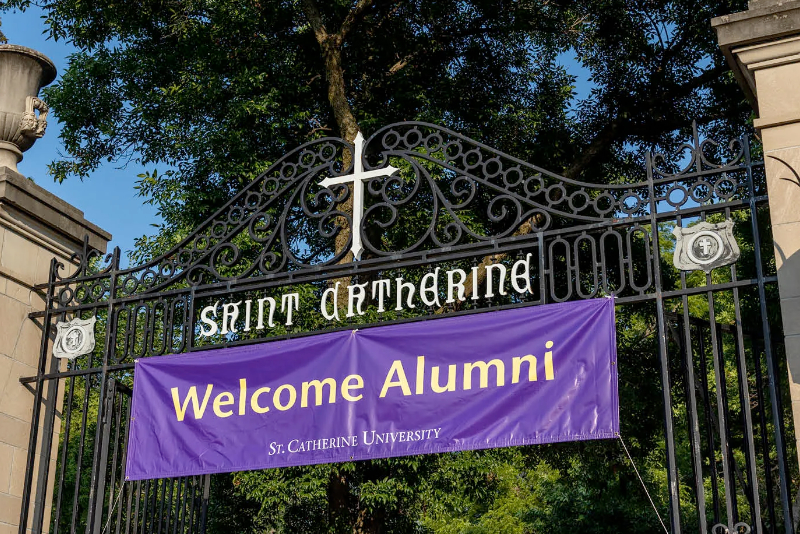 Welcome Alumni sign for Reunion posted at the front gates of St. Catherine University