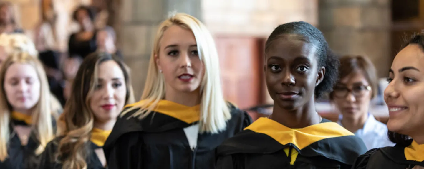 picture of St. Kate's students graduating